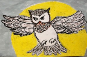 Owl against a yellow moon