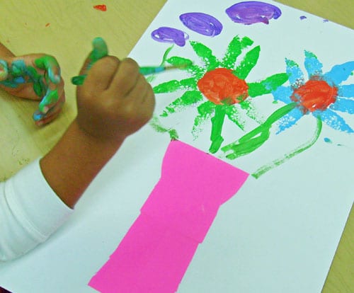 easy vase and stamped flowers art project for kindergarteners with tempera paints