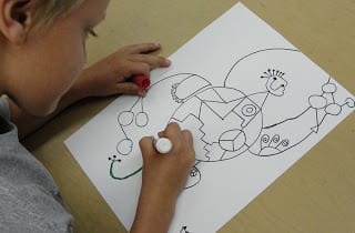 Student drawing Joan Miro figure