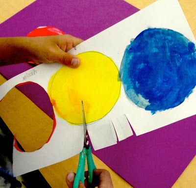 Colorwheel flowers spring art lesson using primary colored tempera paints