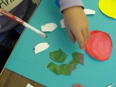 Colorwheel flowers spring art lesson using primary colored tempera paints