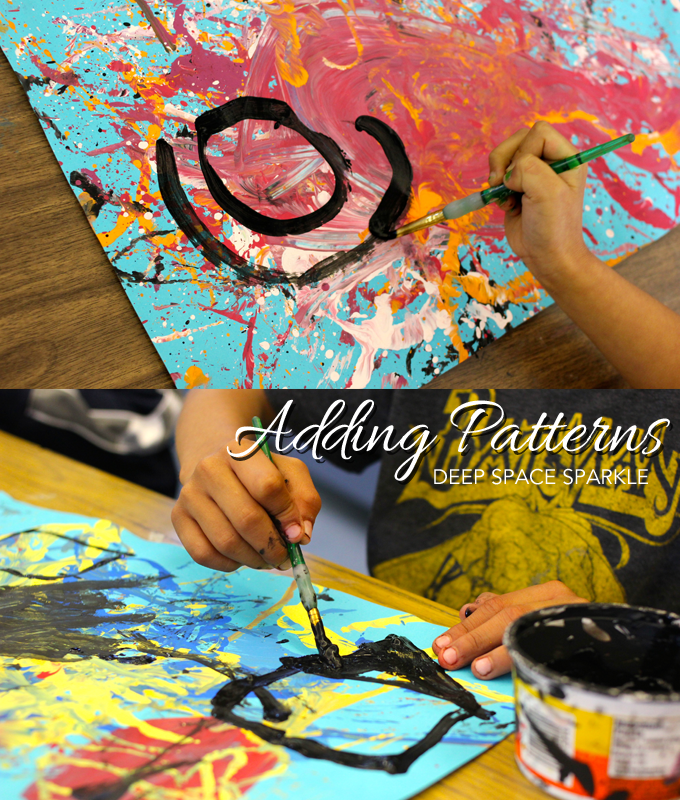 First grade kids read the book, Action Jackson, then create a Pollock Painting using a cool technique.
