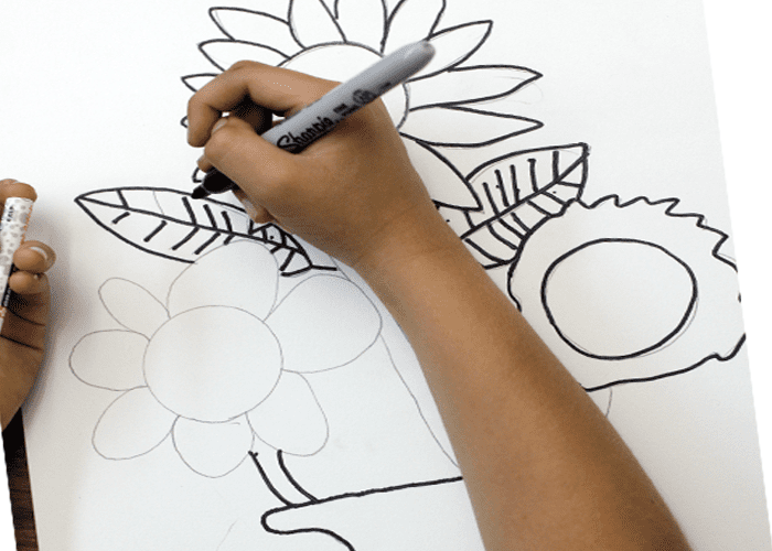 Kids draw flowers with a marker and use liquid watercolor paints to add glorious color
