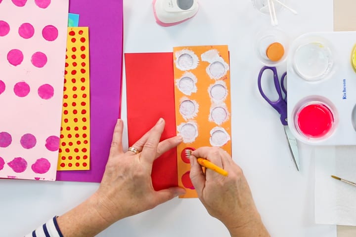Use a large hole punch to create stencil