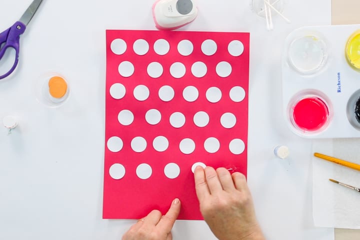 Cut and paste circles with contrasting colored paper