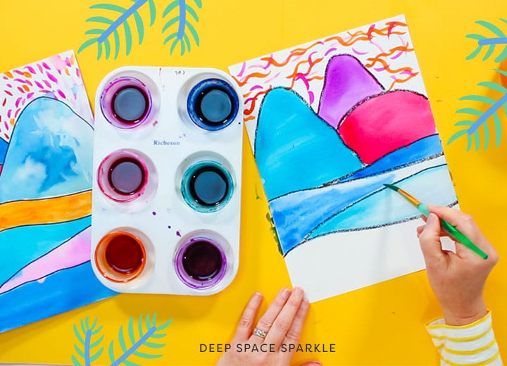 ted harrison inspired polar bear art project for kids using pan watercolors to create a landscape