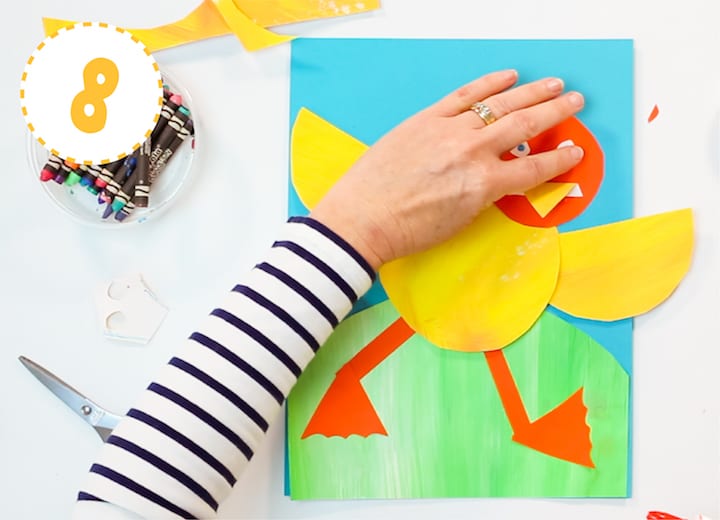 dancing paper duckling art project for kids with step-by-step instructions